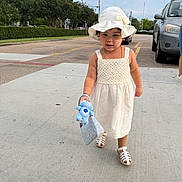 Sahily Arlet joined the competition — help win amazing prizes! accessory, car, child, cute, daytime, girl, outdoor, parking_lot, person, purse, sandals, sidewalk, stuffed_toy, summer, sunhat, toddler, toy, walking, white_dress, young_child