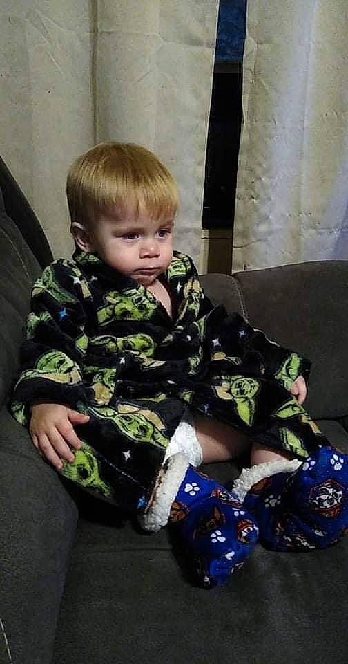 Waylyn joined the competition — help win amazing prizes! arm, baby, baby_toddler_clothing, child, comfort, couch, electric_blue, eye, fun, iris, lap, leg, pattern, person, play, room, sitting, sleeve, sock, thigh