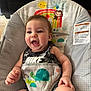 baby, smiling, child, baby_seat, turtle, rainbow, monkey, tank_top, nike, indoor, happy, cute, infant, clothing, seatbelt, bright_shorts, person, portrait, fun, colorful
