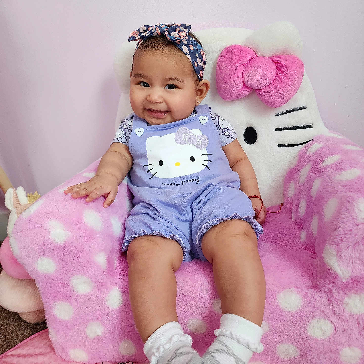 Daniela is registered to the contest to win money with this photo: baby, chair, clothing, couch, cushion, face, footwear, furniture, happy, hat, head, homedecor, pants, person, photography, portrait, shoe, shorts, sitting, smile