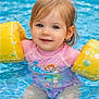 baby, blue_water, child, closeup, cute, floaties, fun, happy, outdoor, pink_swimsuit, playful, pool, portrait, smiling, splashing, summer, swimming, toddler, water, yellow