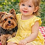 Kayla participe au concours pour gagner de l'argent avec cette photo : animal, baby, bow, child, cute, dog, friendship, grass, happy, nature, outdoor, pet, picnic_blanket, playful, portrait, sitting, smiling, summer, toddler, yellow_dress