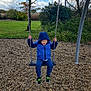 blue_jacket, casual_clothing, child, clouds, daytime, footwear, fun, grass, greenery, happy, hood, nature, outdoor, playground, playing, recreation, sky, swing, trees, young_child