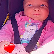 Lylyana a rejoint le concours — aidez-le/la à gagner de superbes lots ! baby, blanket, car_seat, child, clothing, cozy, cute, face, hand, happy, hoodie, indoor, infant, pink, portrait, seatbelt, smile, unicorn, warm, young