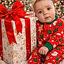 baby, celebration, child, christmas, cozy, cute, decorations, festive, gift, holiday, indoors, lights, pajamas, present, red_bow, sitting, smiling, snowflakes, soft, winter