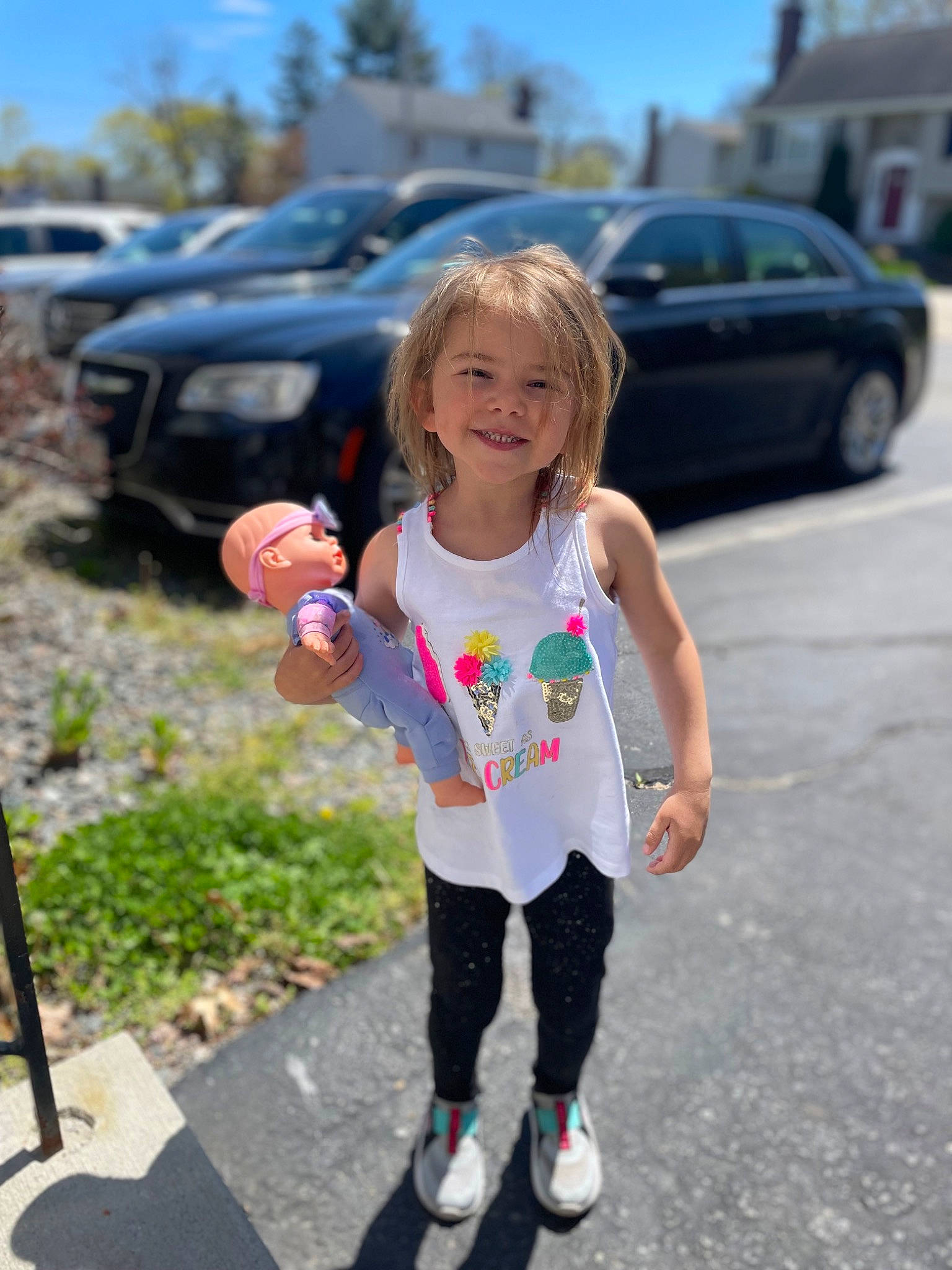 Leah joined the competition — help win amazing prizes! asphalt, automotive_exterior, car, footwear, fun, grass, happy, joy, land_vehicle, leisure, motor_vehicle, person, pink, plant, road, smile, summer, tire, toddler, tree