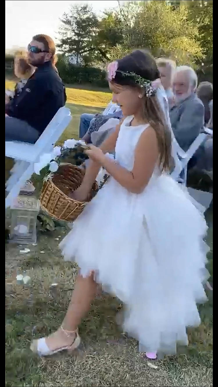 Halaina joined the competition — help win amazing prizes! bridal_accessory, bridal_clothing, bridal_party_dress, child, dress, event, formal_wear, fun, gown, grass, hairstyle, happy, hat, person, sandal, shoe, sun_hat, toddler, wedding_ceremony_supply, wedding_dress