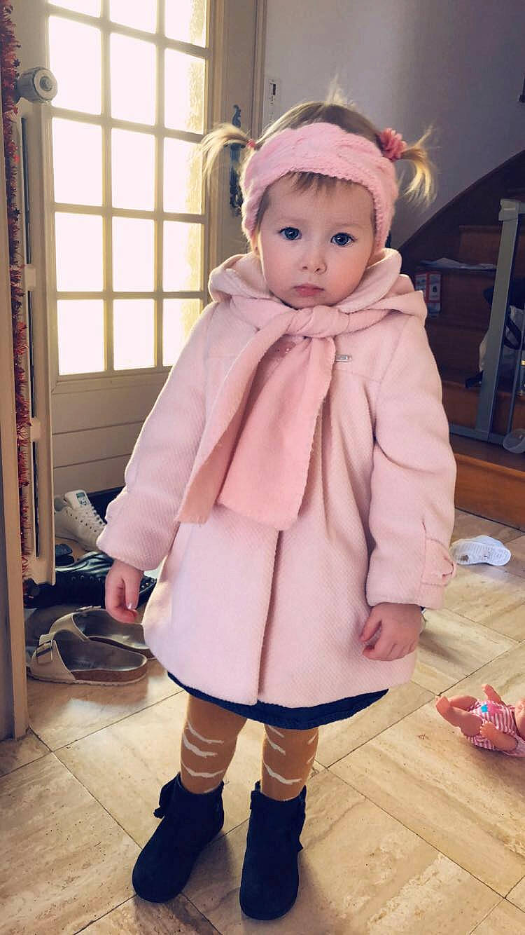 Elya participe au concours pour gagner de l'argent avec cette photo : child, costume, doll, girl, headwear, infant, outerwear, person, pink, product, purple, skin, textile, toddler