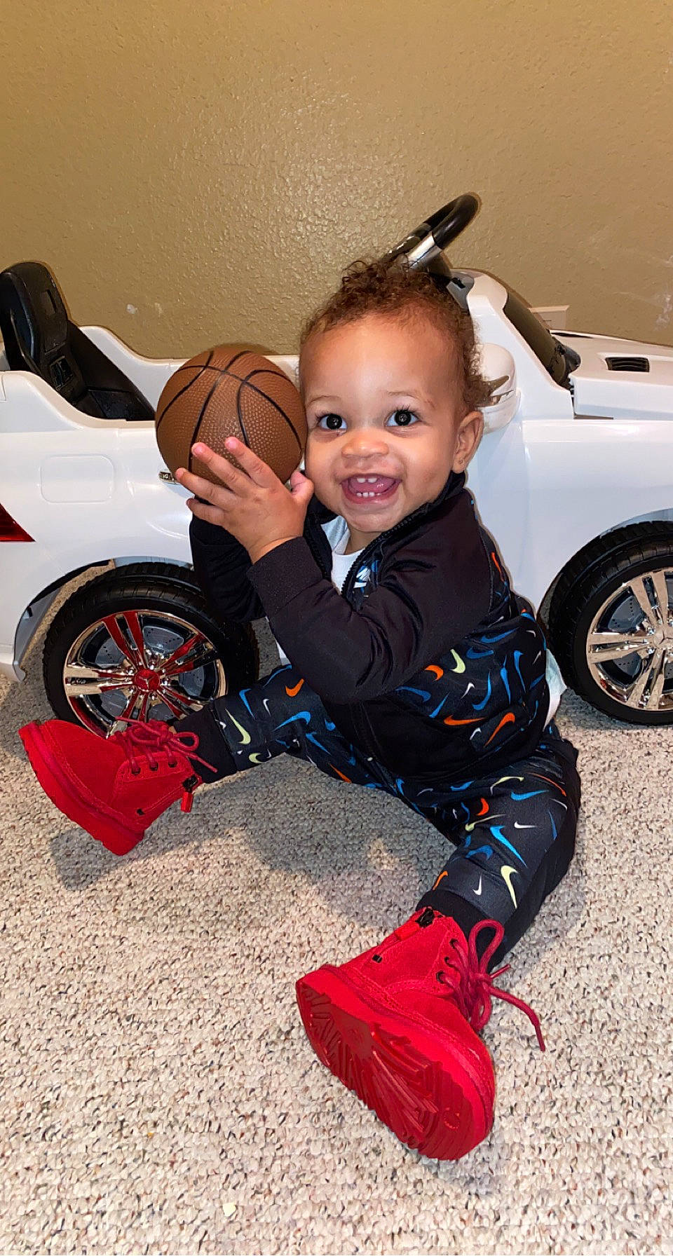 Ayden joined the competition — help win amazing prizes! automotive_design, automotive_exterior, automotive_tire, automotive_wheel_system, baby, car, child, electric_blue, event, flash_photography, flooring, fun, happy, joy, person, rim, smile, tire, toddler, vehicle