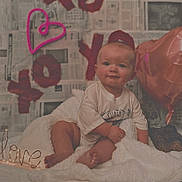 Lane joined the competition — help win amazing prizes! baby, bodypart, clothing, couch, face, finger, furniture, hand, hat, head, homedecor, newborn, people, person, photography, portrait, quilt, sitting, t_shirt, text