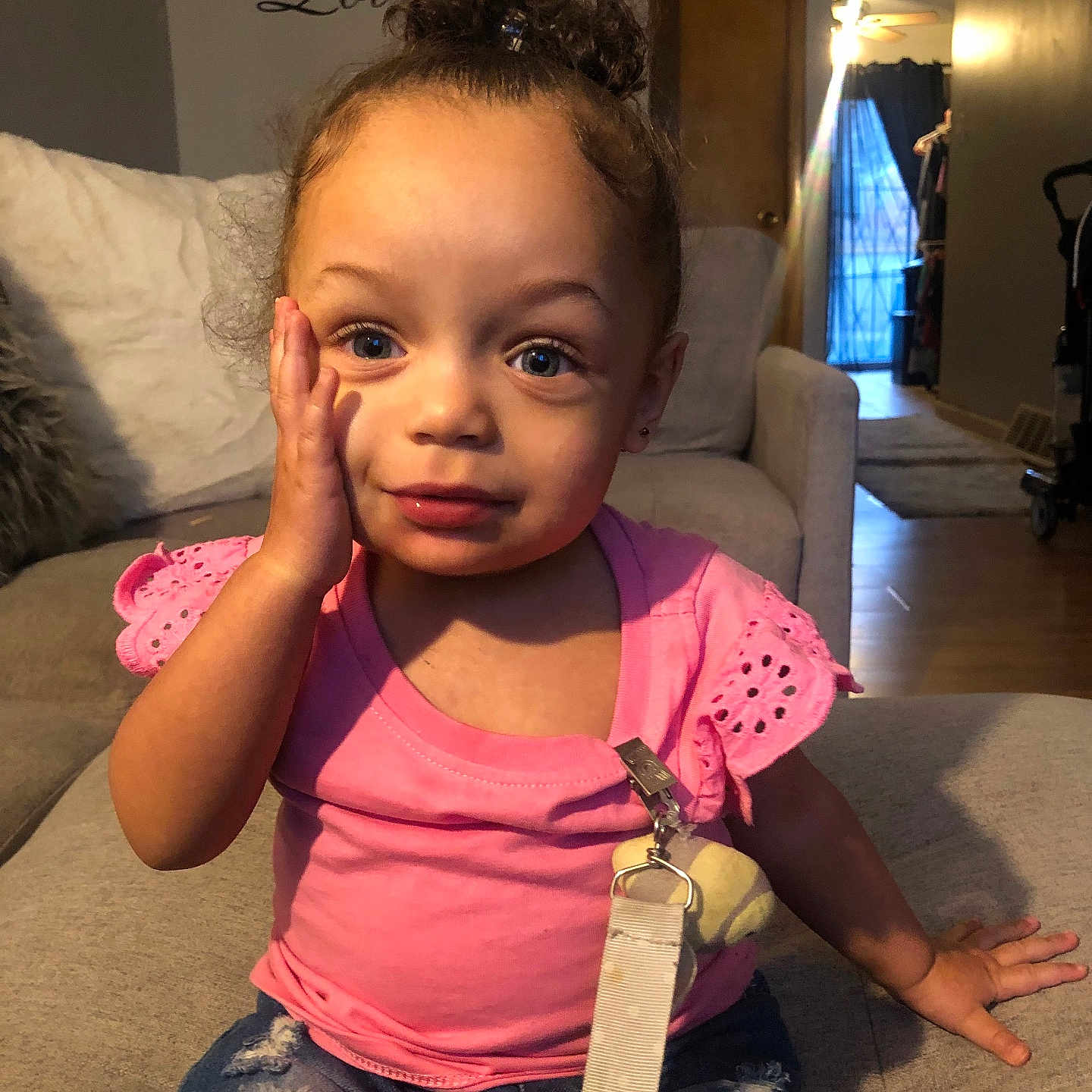 Nimarrie is registered to the contest to win money with this photo: architecture, baby, bodypart, building, clothing, couch, face, finger, furniture, hand, head, homedecor, indoors, livingroom, pants, person, photography, portrait, room, t_shirt