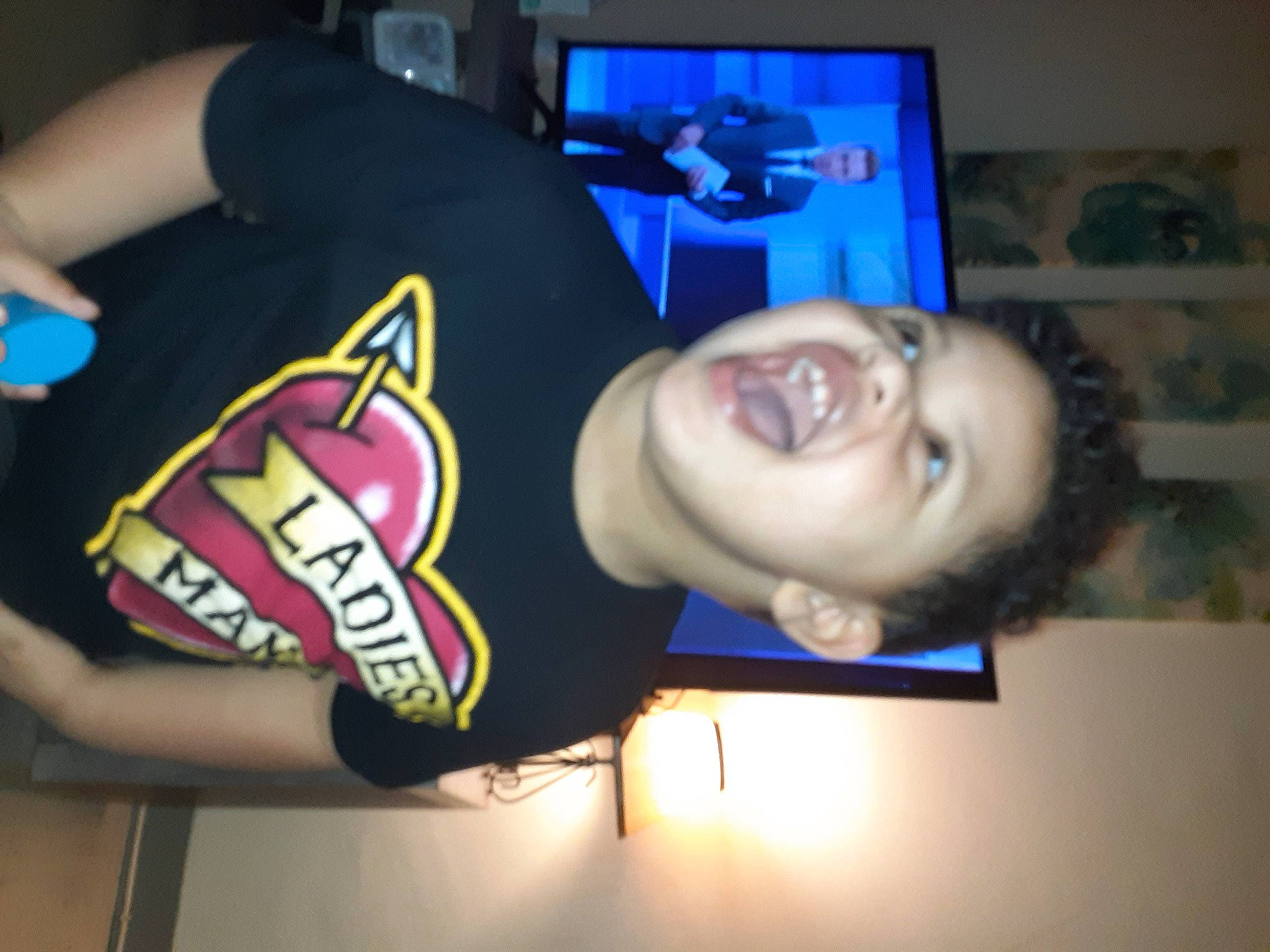 Malachai is registered to the contest to win money with this photo: blurred, electronic_device, finger, fun, hand, media, mouth, person