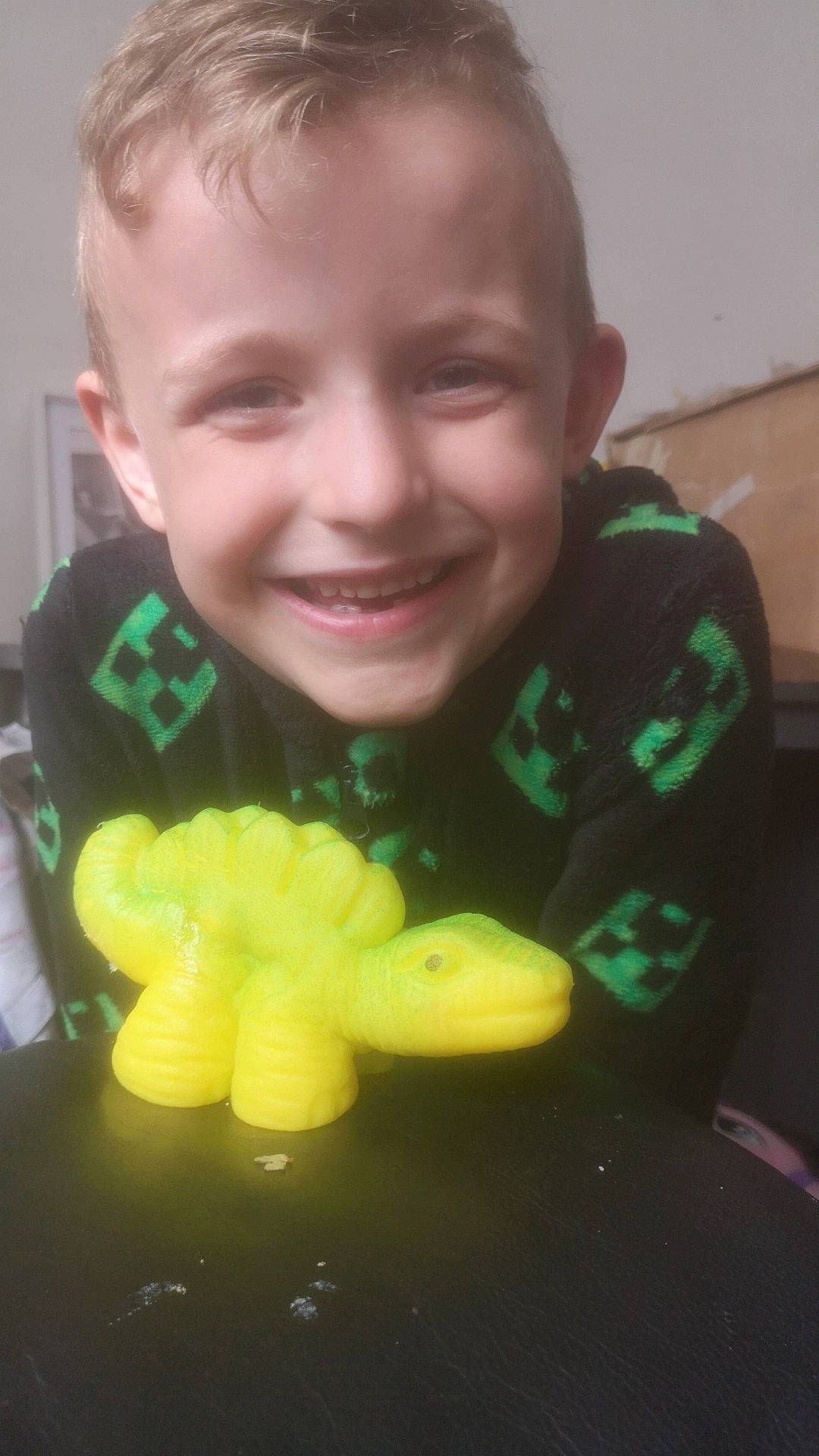 Harrison Charles is registered to the contest to win money with this photo: child, comfort_food, fun, gesture, glove, grass, happy, joy, laugh, person, smile, stuffed_toy, sweetness, thumb, toddler, toy