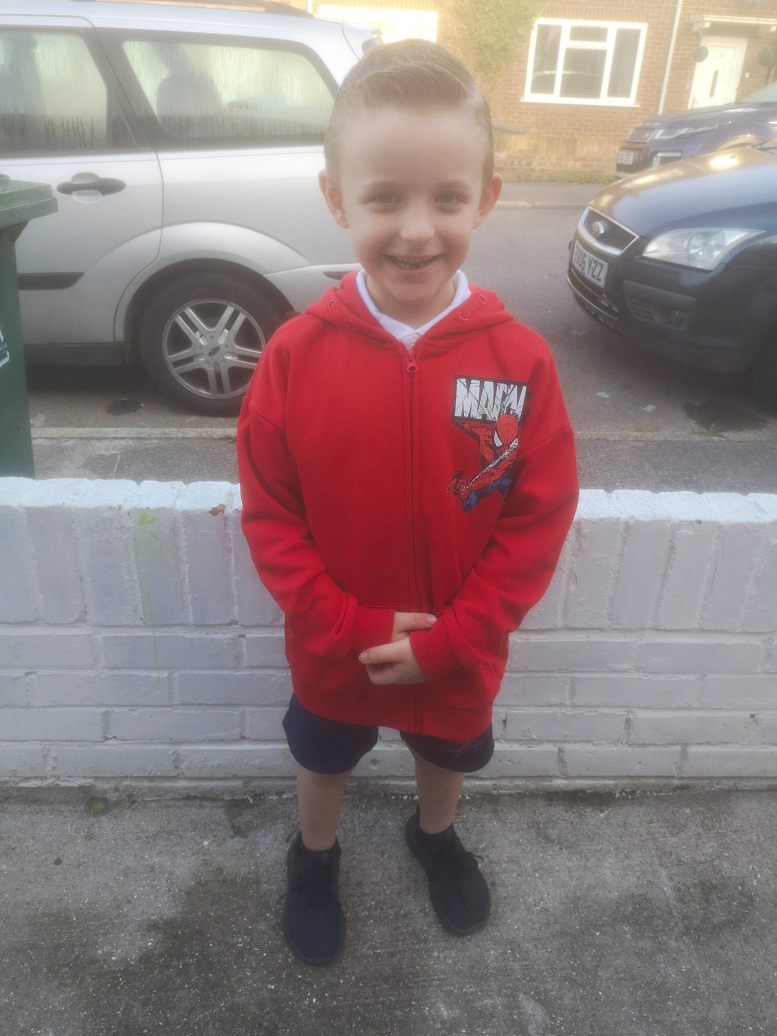 Harrison Charles is registered to the contest to win money with this photo: asphalt, automotive_design, automotive_exterior, automotive_tire, car, family_car, joy, land_vehicle, luxury_vehicle, motor_vehicle, parking, person, personal_luxury_car, plant, road, road_surface, smile, tire, toddler, vehicle