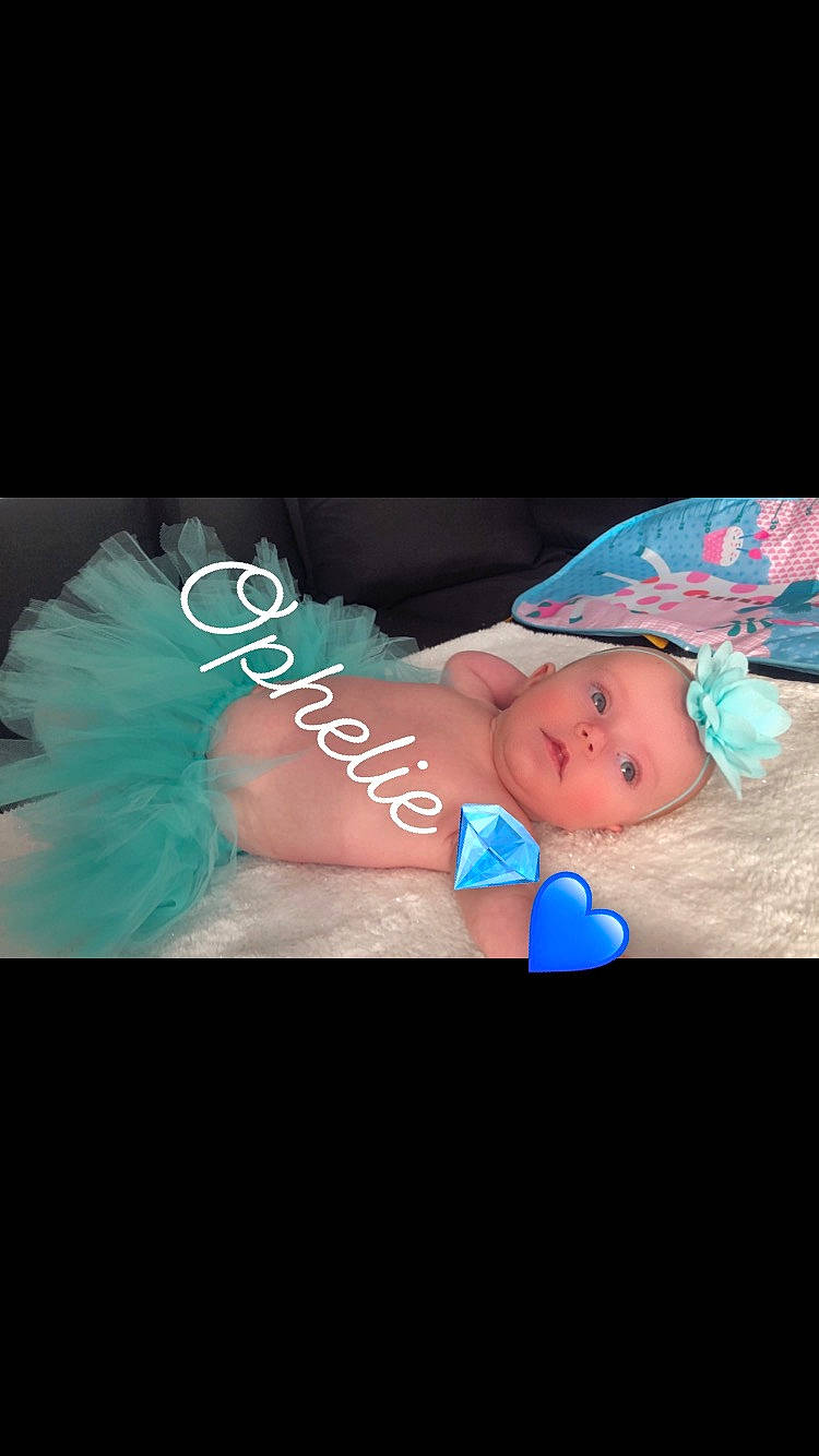 Lahna participe au concours pour gagner de l'argent avec cette photo : baby, baby_products, baby_toddler_clothing, beanie, child, electric_blue, eye, fashion_accessory, flash_photography, font, hair_accessory, happy, hat, headgear, headpiece, jewellery, magenta, pattern, person, sleeve