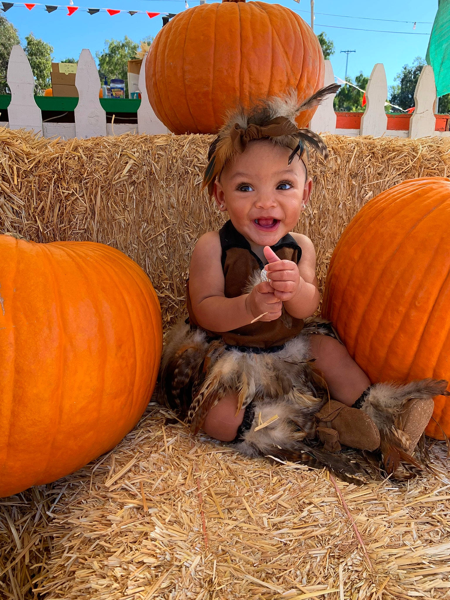 Aleiah joined the competition — help win amazing prizes! _and_melon_family, _gourd, calabaza, child, cucumber, cucurbita, food, fruit, gourd, hay, local_food, person, plant, produce, pumpkin, squash, straw, toddler, vegetable, vegetarian_food