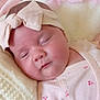 adorable, baby, blanket, bow, child, closeup, clothing, cute, face, headband, indoors, infant, newborn, onesie, peaceful, pink, pink_theme, resting, sleeping, soft