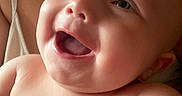 Azalea is registered to the contest to win money with this photo: baby, smiling, closeup, face, happy, child, skin, mouth, eyes, person, infant, arm, human, cute, joy, portrait, expression, background, naked, love