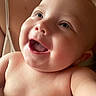 baby, smiling, closeup, face, happy, child, skin, mouth, eyes, person, infant, arm, human, cute, joy, portrait, expression, background, naked, love