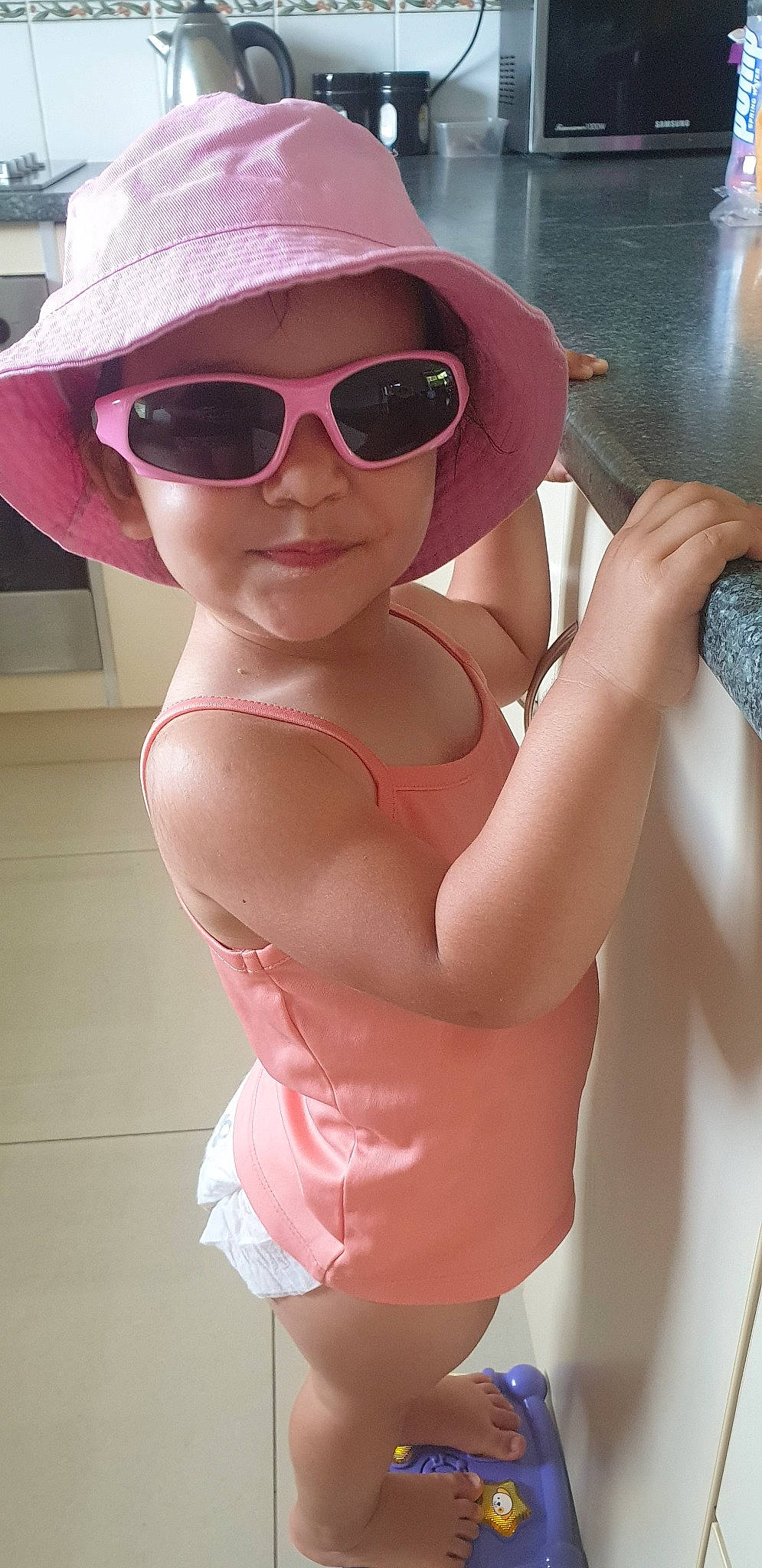 Allyssa is registered to the contest to win money with this photo: abdomen, arm, beauty, chest, clothing, cool, eyewear, glasses, hat, headgear, headwear, lip, muscle, neck, person, pink, selfie, shoulder, skin, sun_hat