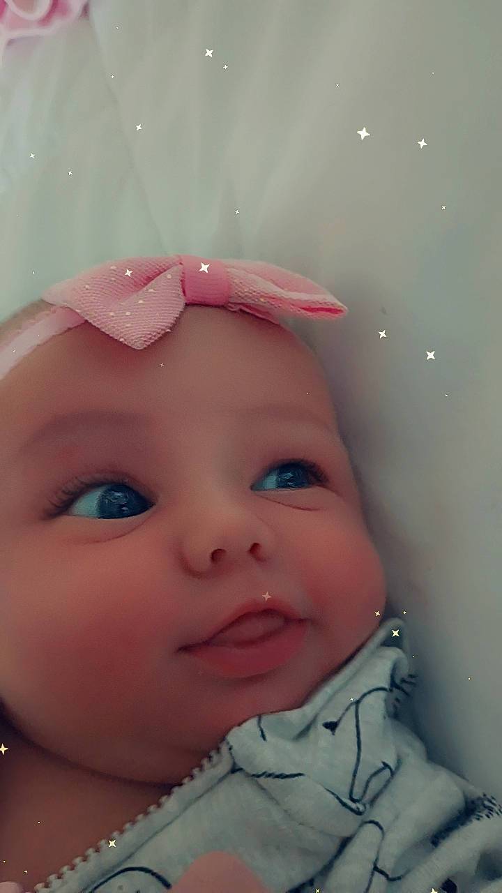 Melissa joined the competition — help win amazing prizes! baby, cheek, chin, ear, eye, eyebrow, eyelash, face, forehead, hair, happy, headgear, human_body, iris, lip, mouth, nose, person, pink, skin