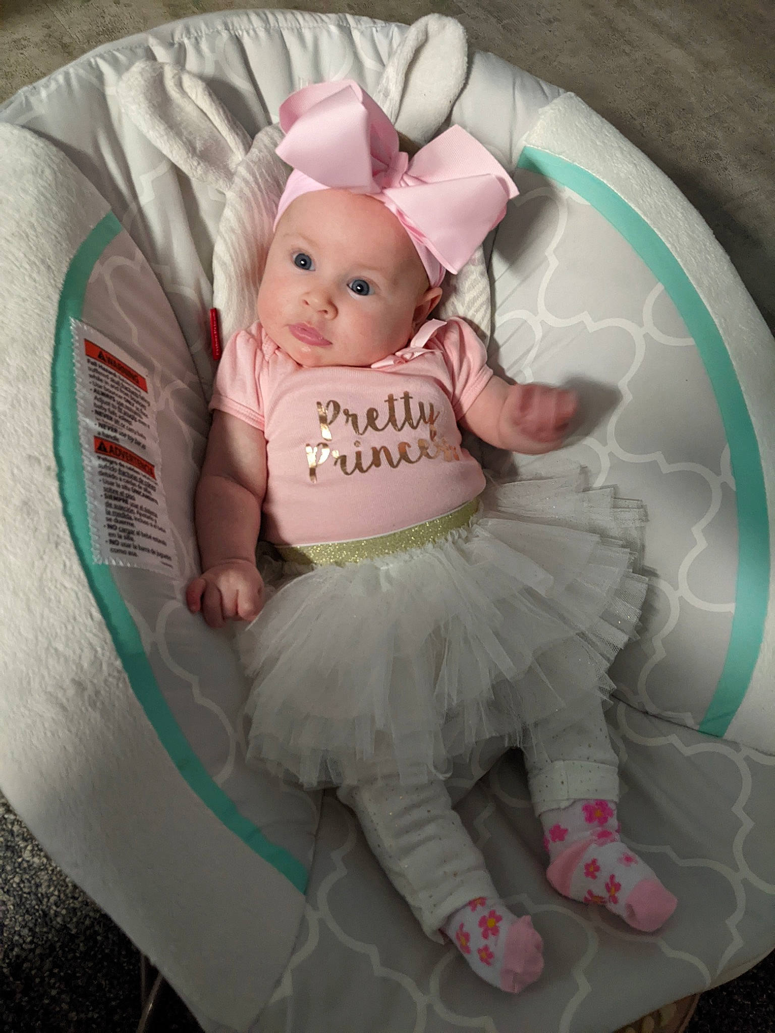 Halo joined the competition — help win amazing prizes! baby, baby_products, baby_toddler_clothing, child, circle, comfort, dress, fashion_accessory, happy, headwear, linens, magenta, mythical_creature, pattern, person, pink, ruffle, sitting, sleeve, sock