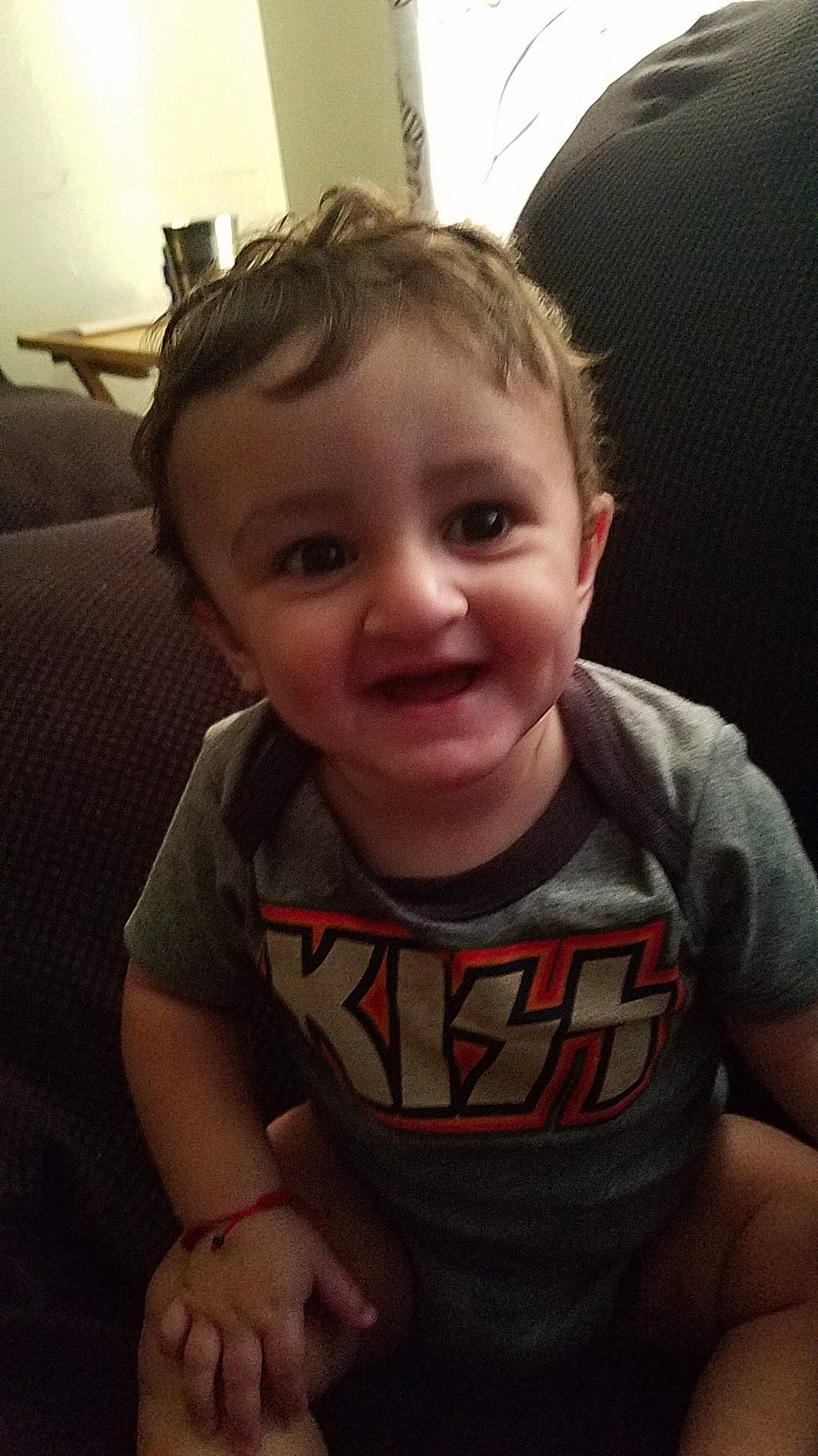 Amar is registered to the contest to win money with this photo: boy, cheek, child, chin, day, emotion, eye, eyebrow, face, facial_expression, forehead, hair, hairstyle, head, human_hair_color, joy, nose, sitting, skin, smile