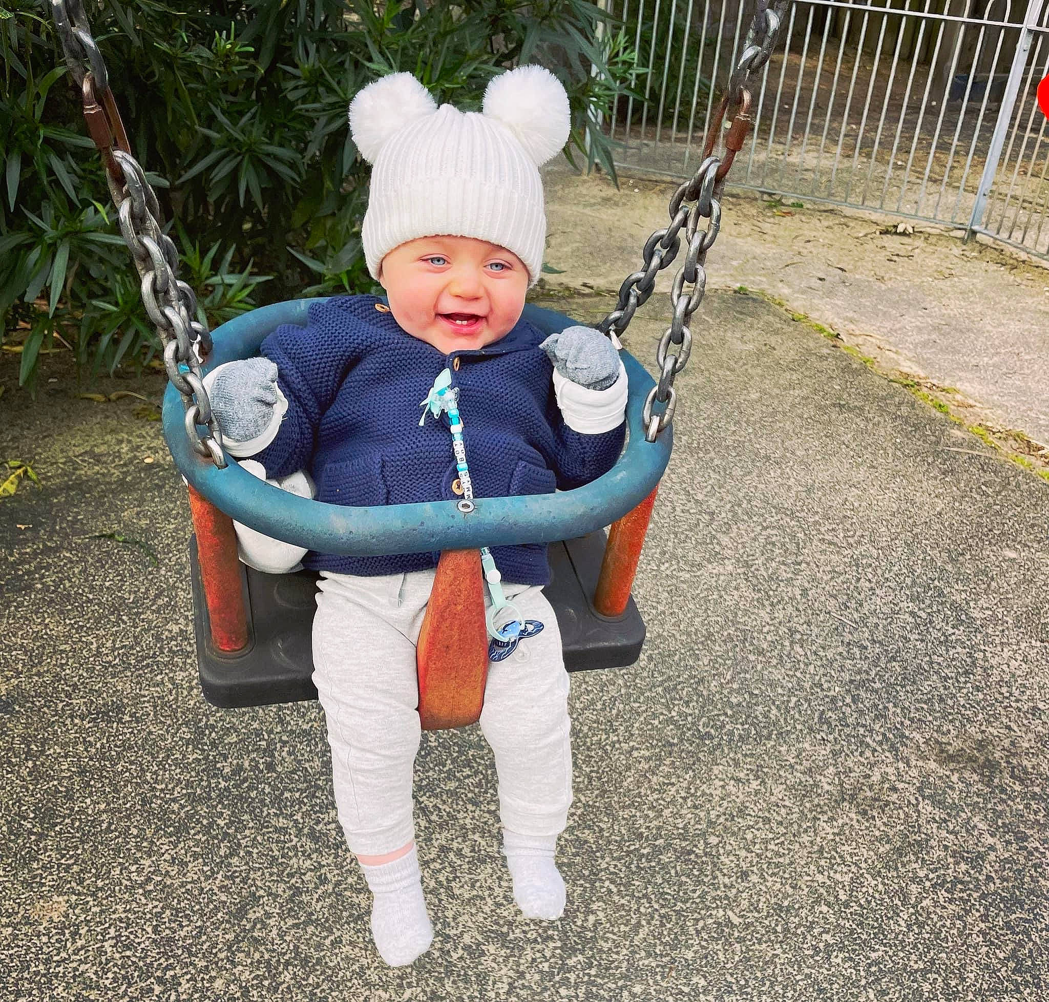 Casey joined the competition — help win amazing prizes! baby, baby_toddler_clothing, city, electric_blue, eye, fence, fun, grass, hand, happy, head, headwear, human_body, leisure, outdoor_play_equipment, person, plant, playground, recreation, smile