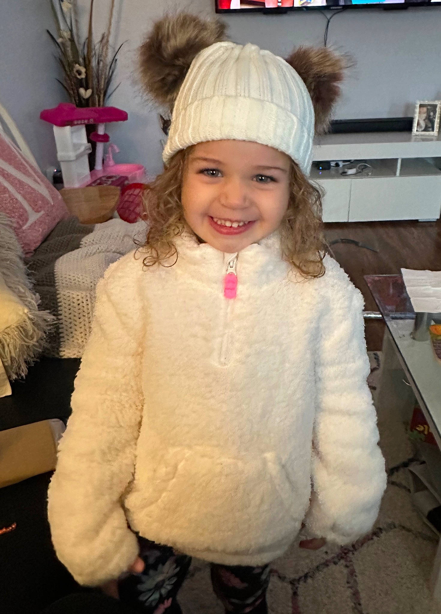 Maliya is registered to the contest to win money with this photo: cap, child, event, eye, fashion, fashion_design, fun, fur, hairstyle, happy, headgear, headwear, joy, magenta, person, pink, sleeve, smile, television, textile