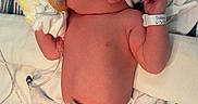 Lorelai joined the competition — help win amazing prizes! newborn, baby, hospital, crib, blanket, hat, medical_tube, diaper, pacifier, infant, patient, sleeping, cute, healthcare, monitoring, tiny, fragile, child, bed, wrapped