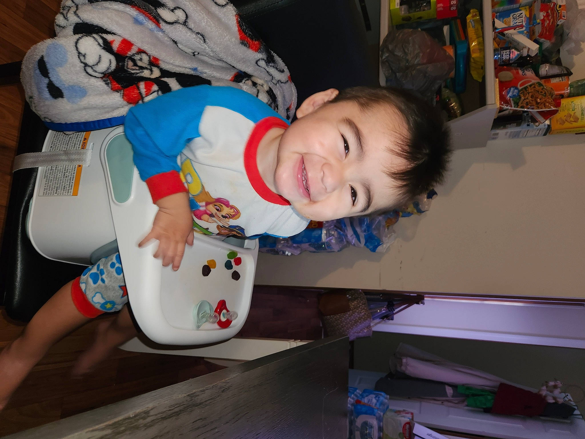 Aiden joined the competition — help win amazing prizes! baby, baby_toddler_clothing, carmine, child, comfort, fun, happy, joy, person, plastic, play, room, shelf, sitting, smile, t_shirt, toddler