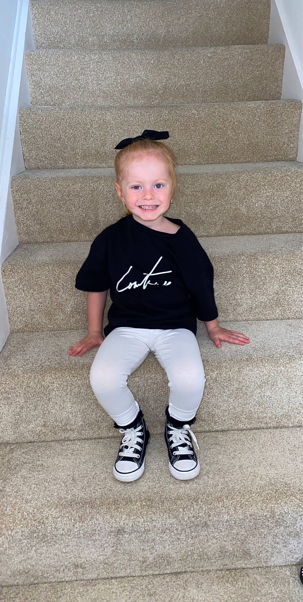 Lyla-rose is registered to the contest to win money with this photo: baby, baby_toddler_clothing, child, footwear, joy, leg, person, shoe, sitting, skin, sleeve, smile, standing, t_shirt, toddler