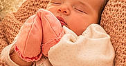 Lottie is registered to the contest to win money with this photo: baby, sleeping, mittens, pink, blanket, cozy, infant, cute, soft, warm, knit, child, portrait, indoor, hands, clothing, resting, newborn, peaceful, face