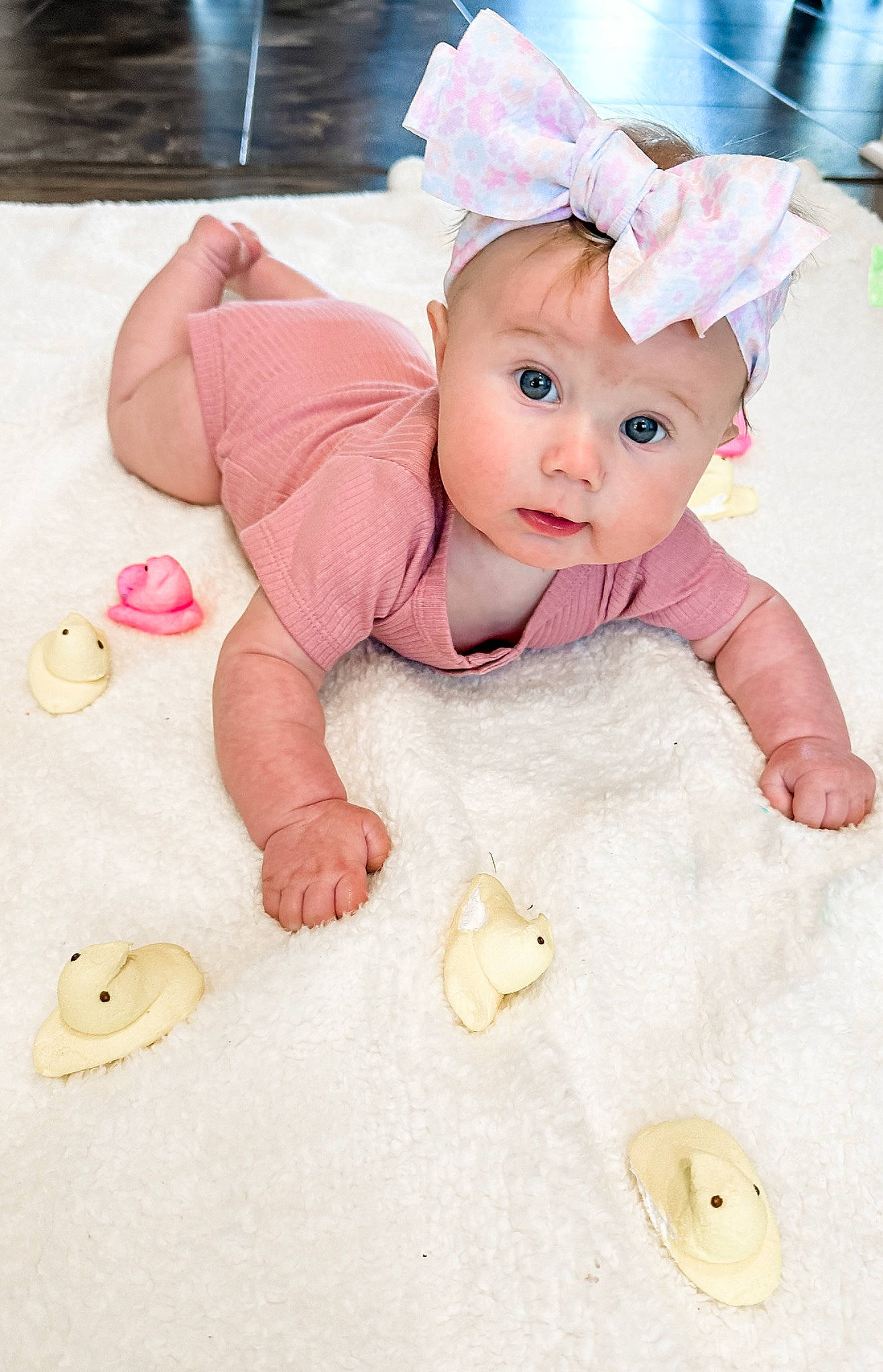 Kinlee is registered to the contest to win money with this photo: baby, baby_products, baby_toddler_clothing, baby_toys, cheek, child, dress, eye, fashion_accessory, flooring, fun, happy, headwear, human_body, nail, person, pink, sitting, skin, surprise