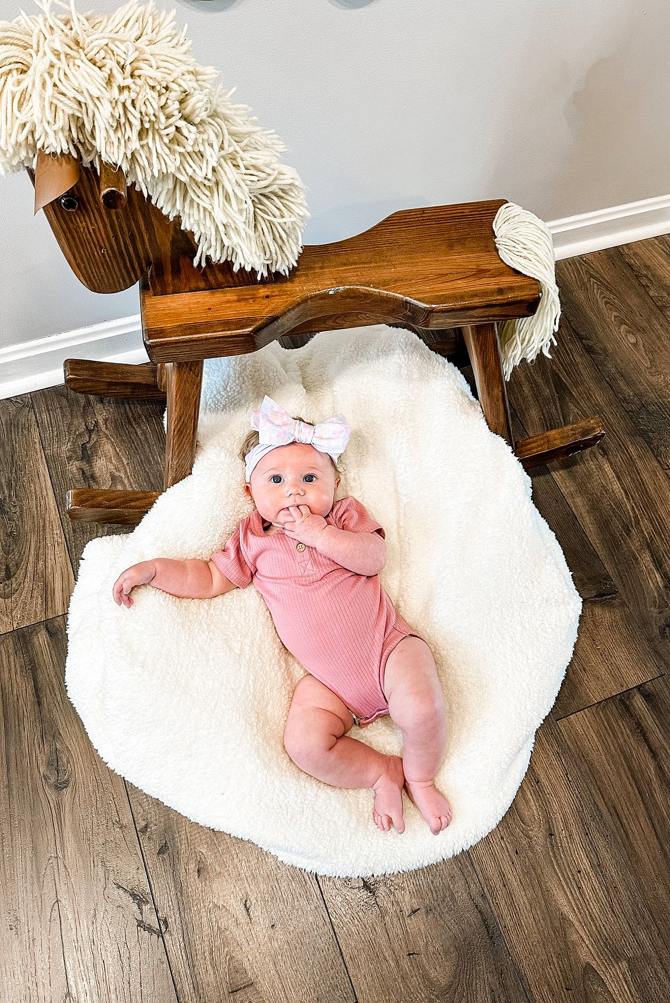 Kinlee joined the competition — help win amazing prizes! baby, baby_products, baby_safety, baby_sleeping, baby_toddler_clothing, bedding, child, comfort, fawn, flooring, fur, happy, hardwood, headwear, infant_bed, linens, peach, person, room, sitting