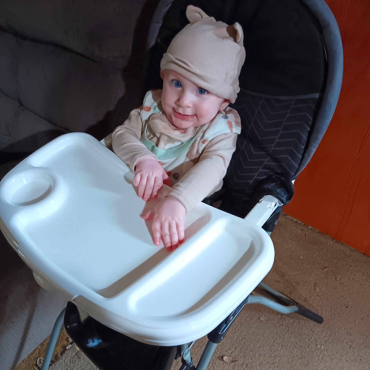 Jayce joined the competition — help win amazing prizes! armchair, baby, beanie, bodypart, bonnet, cap, chair, clothing, face, finger, furniture, hand, hat, head, highchair, hoodie, newborn, person, photography, portrait