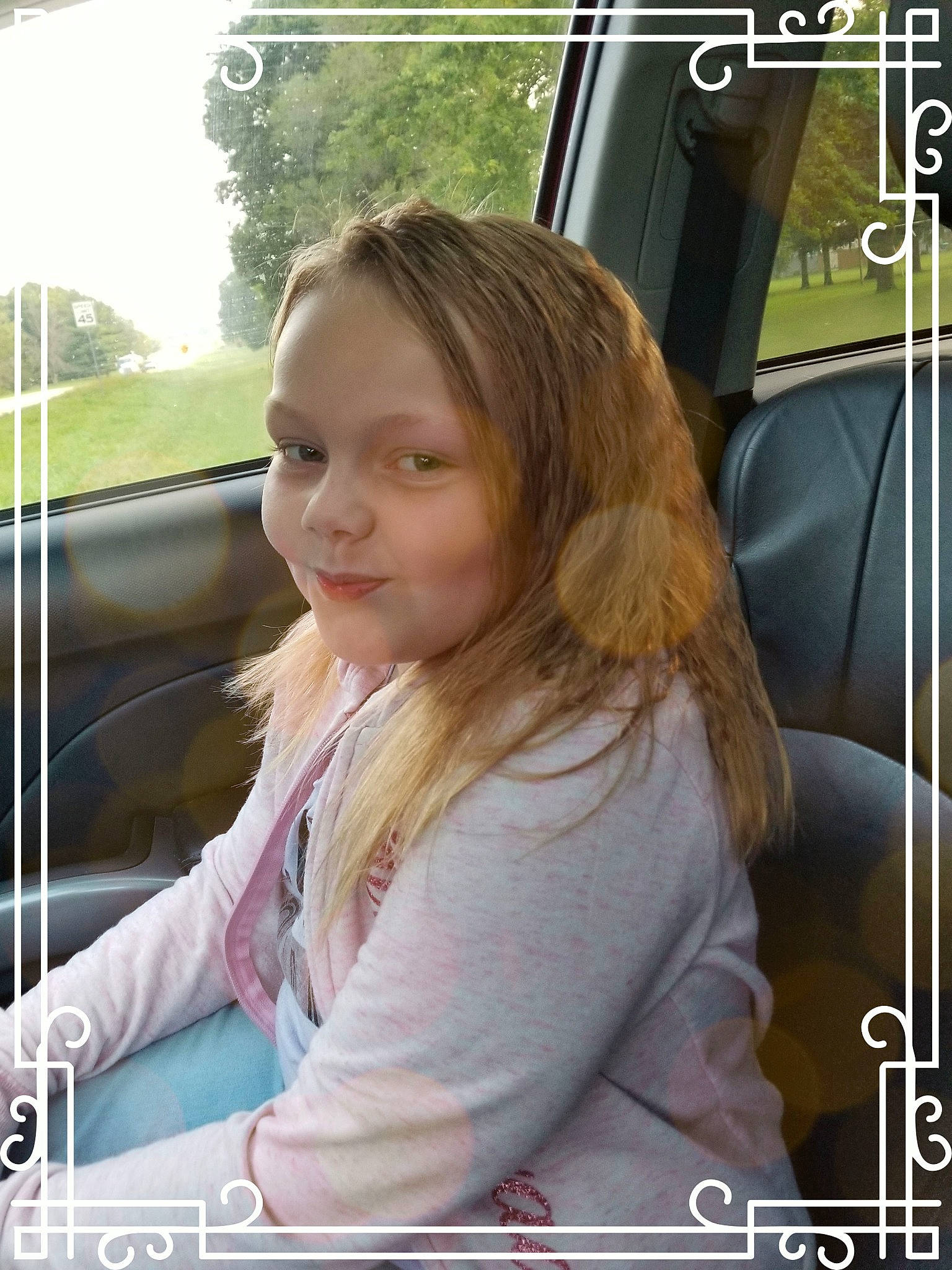 Aliviah is registered to the contest to win money with this photo: auto_part, automotive_design, automotive_exterior, beauty, car, car_seat, facial_expression, grass, happy, joy, leisure, motor_vehicle, mouth, person, skin, smile, snapshot, steering_wheel, tree, vehicle