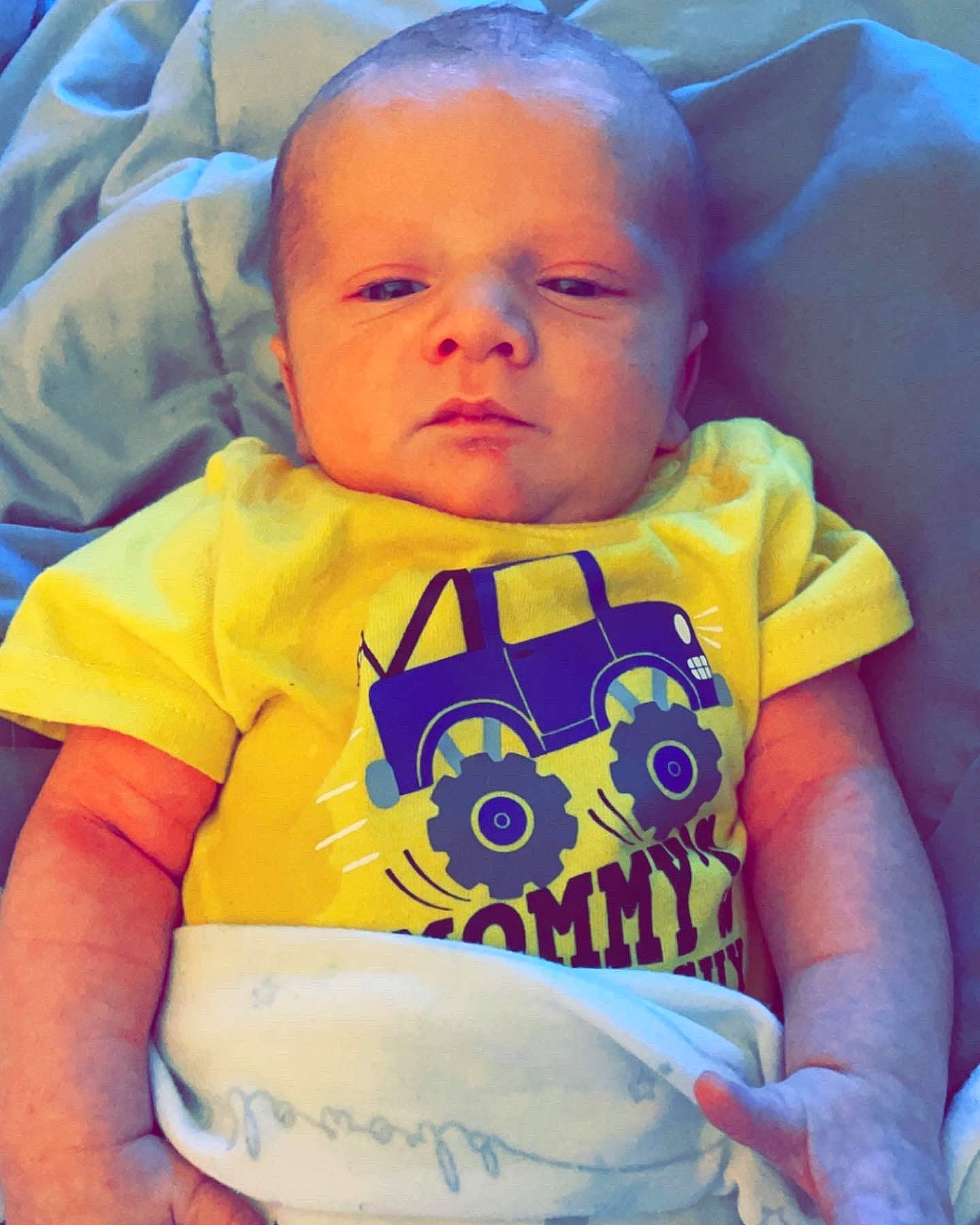 Deegan joined the competition — help win amazing prizes! baby, baby_toddler_clothing, cheek, chin, comfort, cool, face, finger, happy, iris, mammal, mouth, neck, nose, person, product, skin, sleeve, t_shirt, textile