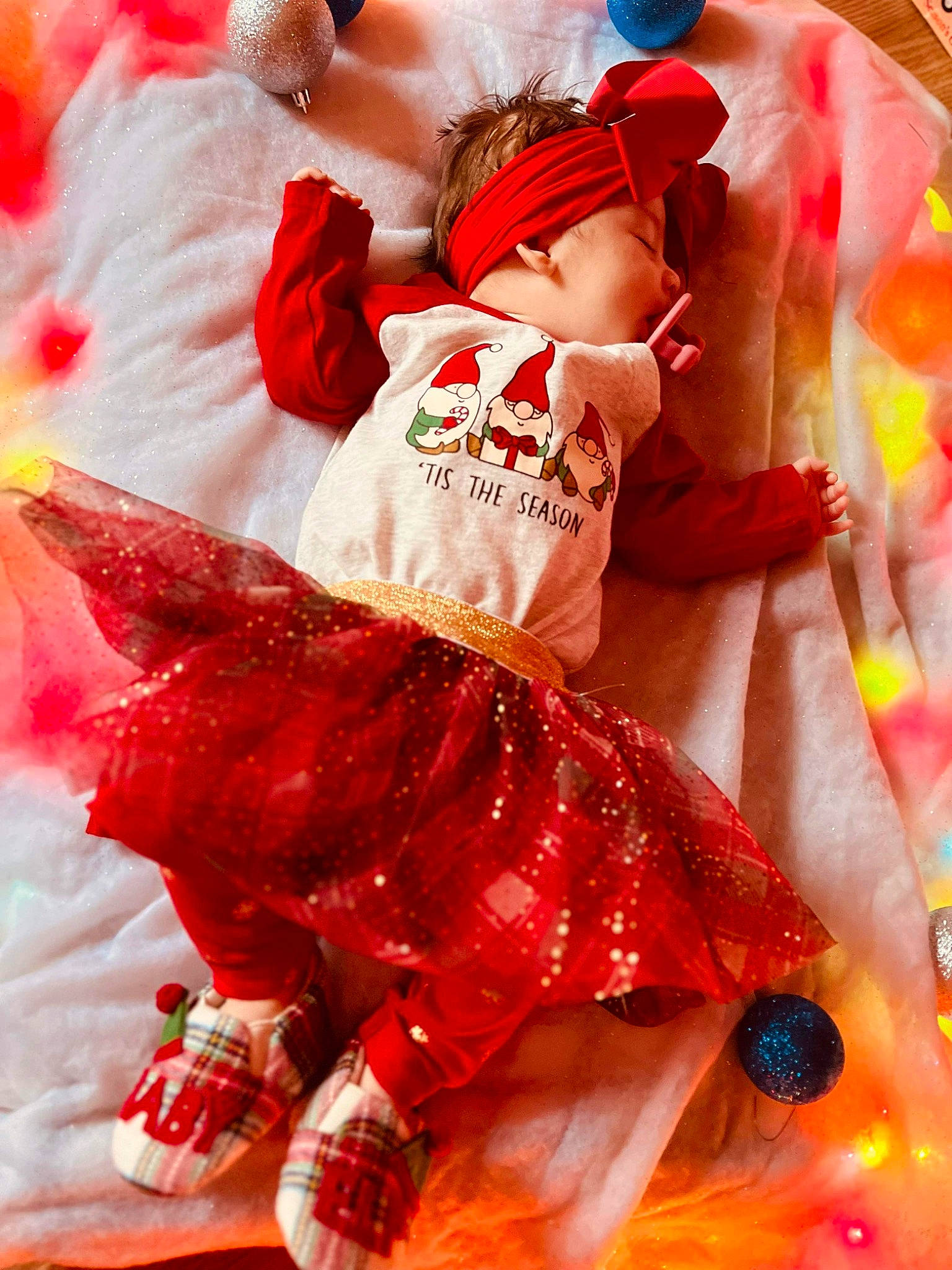 Elliana is registered to the contest to win money with this photo: baby, baby_toddler_clothing, carmine, child, dress, event, fictional_character, fun, happy, human_leg, magenta, pattern, person, pink, play, red, sleeve, textile, thigh, toddler