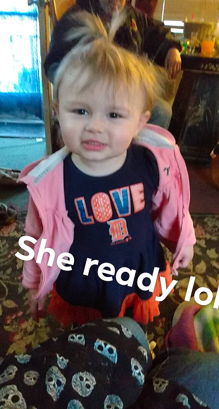 Ariella is registered to the contest to win money with this photo: baby, baby_products, baby_toddler_clothing, blond, cheek, child, cool, fun, happy, iris, people, person, photo_caption, sitting, sleeve, smile, snapshot, sportswear, t_shirt, television