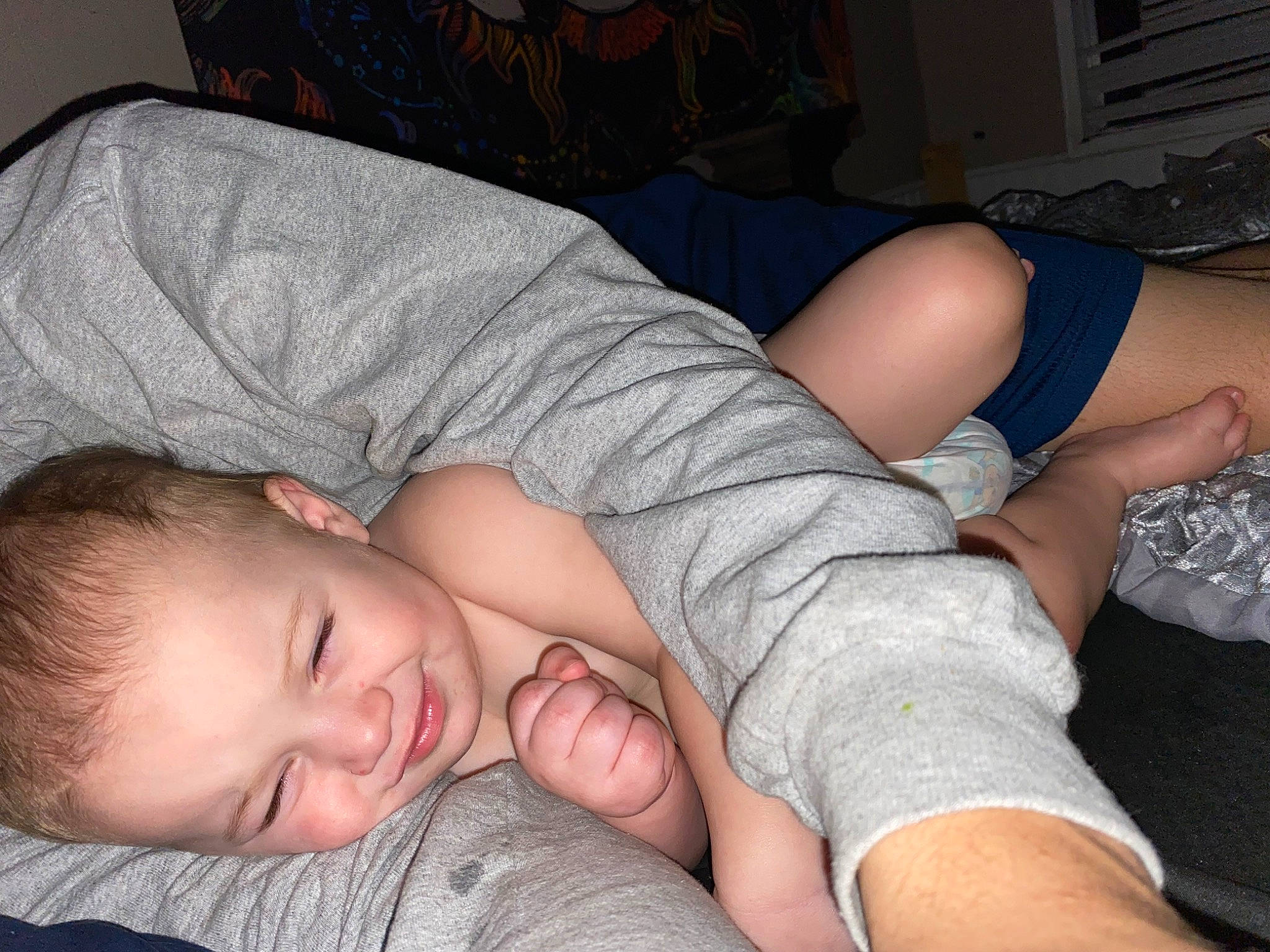 Ezekiel is registered to the contest to win money with this photo: abdomen, black_hair, chest, comfort, elbow, eyelash, facial_expression, finger, gesture, human_leg, joint, joy, knee, leg, mouth, muscle, neck, person, shoulder, skin