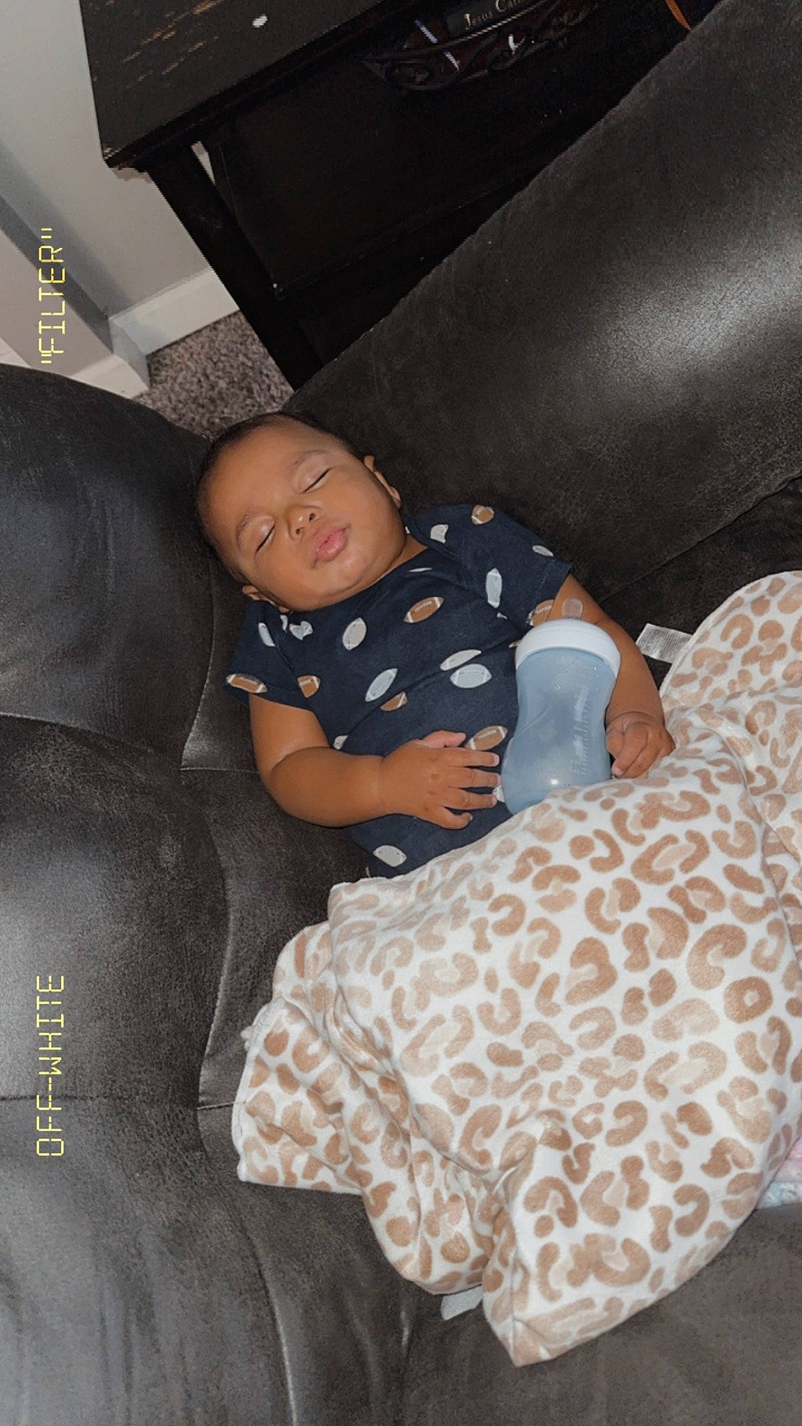 Dhall joined the competition — help win amazing prizes! baby, baby_products, baby_toddler_clothing, bedding, car_seat, car_seat_cover, child, comfort, couch, flooring, human_leg, lap, linens, luxury_vehicle, pattern, person, room, sitting, smile, throw_pillow