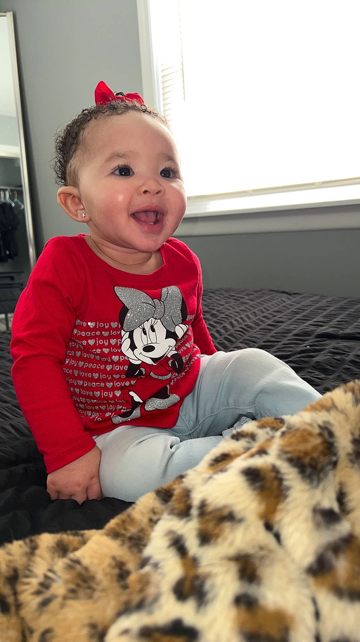 Kalayah is registered to the contest to win money with this photo: baby, baby_toddler_clothing, carnivore, child, comfort, companion_dog, eye, felidae, fun, fur, happy, head, pattern, person, room, sitting, skin, sleeve, smile, t_shirt