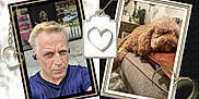 Lucky is registered to the contest to win money with this photo: man, earbuds, selfie, outdoor, dog, couch, indoor, brown_dog, curly_fur, relaxing, portrait, love, decorative_frame, heart_shape, photography, furniture, window, casual, expression, pet