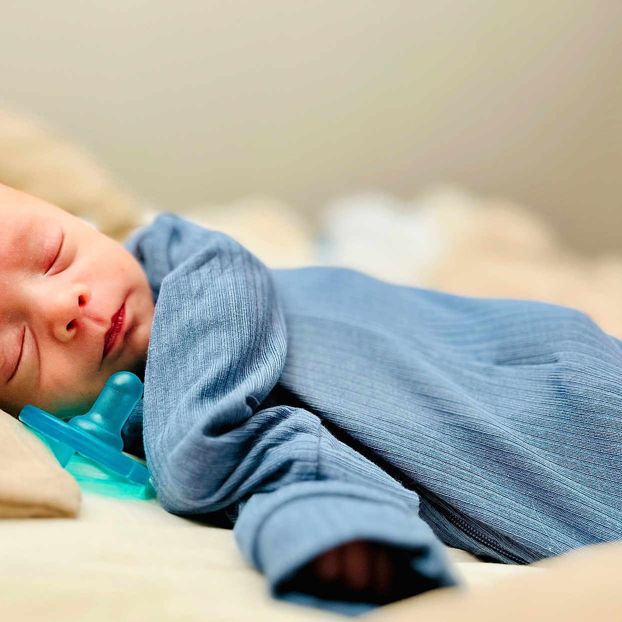 Easton is registered to the contest to win money with this photo: architecture, baby, blanket, building, face, happy, head, hospital, newborn, person, photography, portrait, sleeping, smile