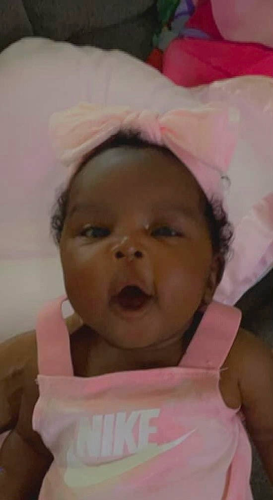 Cali is registered to the contest to win money with this photo: baby, baby_toddler_clothing, cheek, child, ear, eyelash, face, finger, fun, happy, iris, lip, mouth, nose, person, pink, skin, smile, toddler, tongue