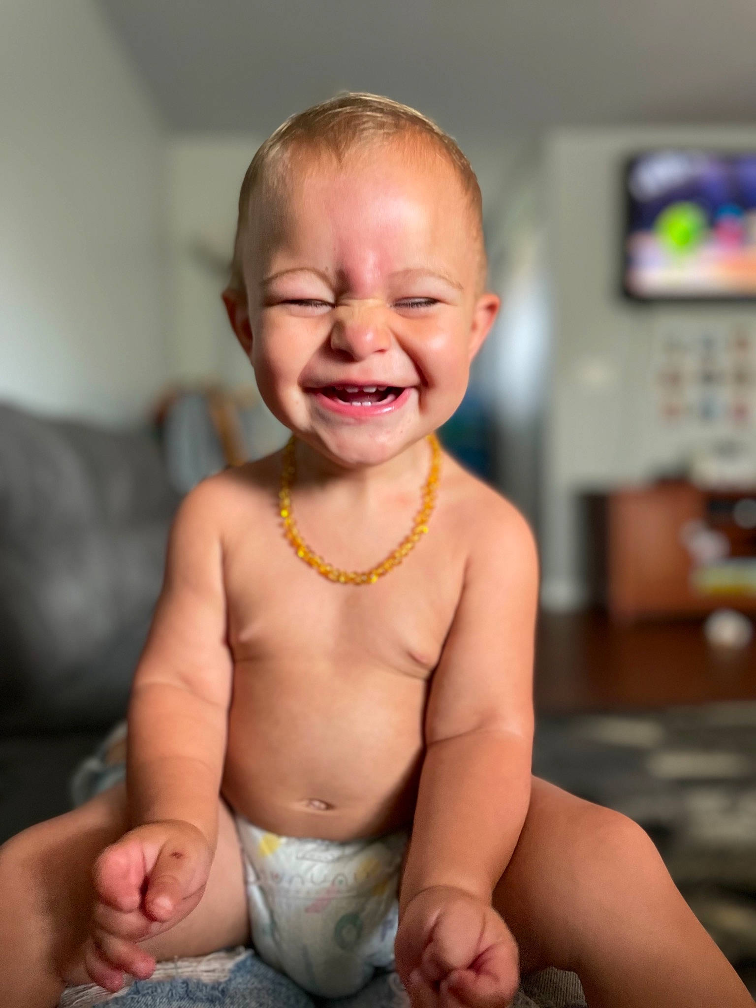 Cruz is registered to the contest to win money with this photo: baby, cheek, chin, eyebrow, facial_expression, finger, flash_photography, gesture, happy, human_body, joint, lip, mouth, muscle, neck, nose, person, shoulder, skin, smile