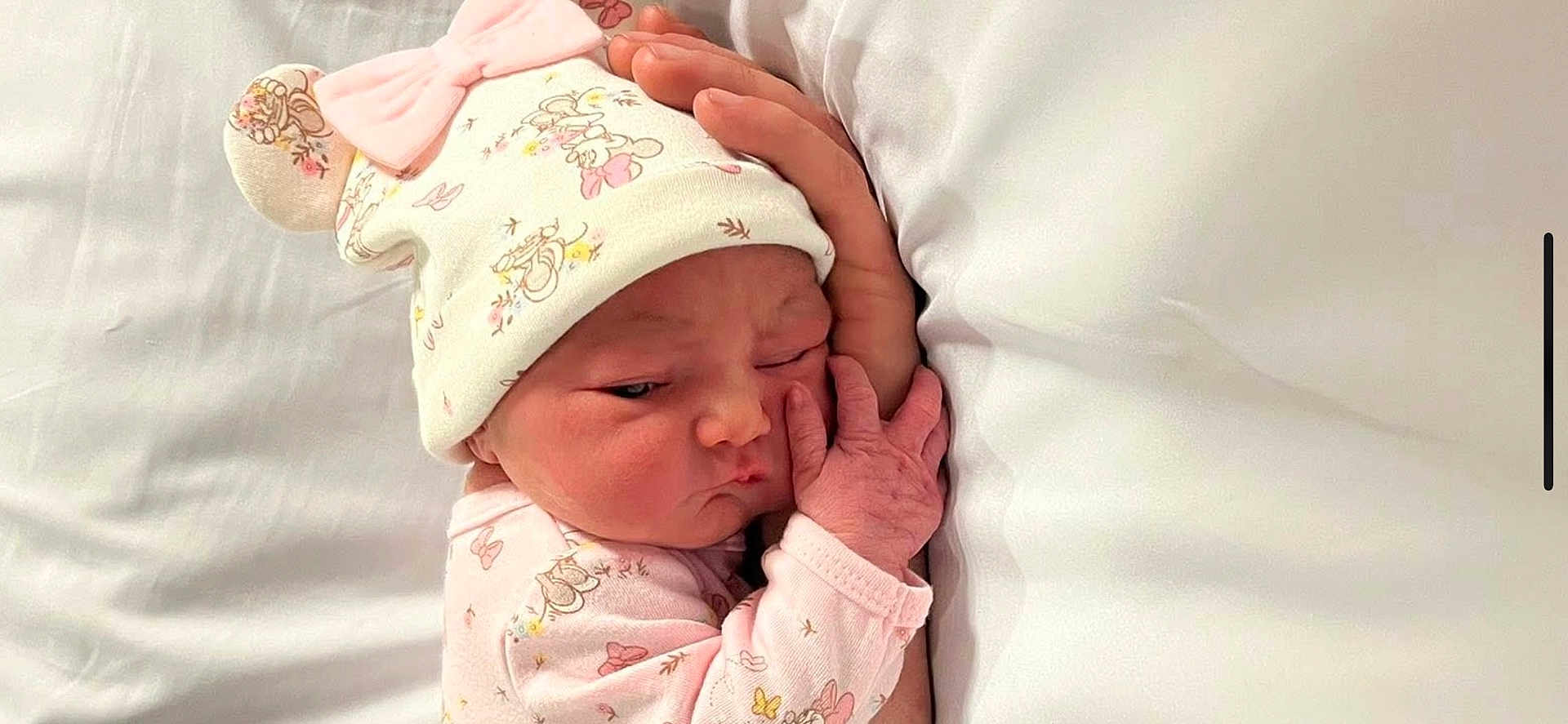 Laynie Reynolds joined the competition — help win amazing prizes! baby, infant, newborn, hat, pink_clothing, hand, sleeping, cute, resting, soft, bed, blanket, person, face, skin, child, cozy, toddler, cute_expression, mickey_mouse