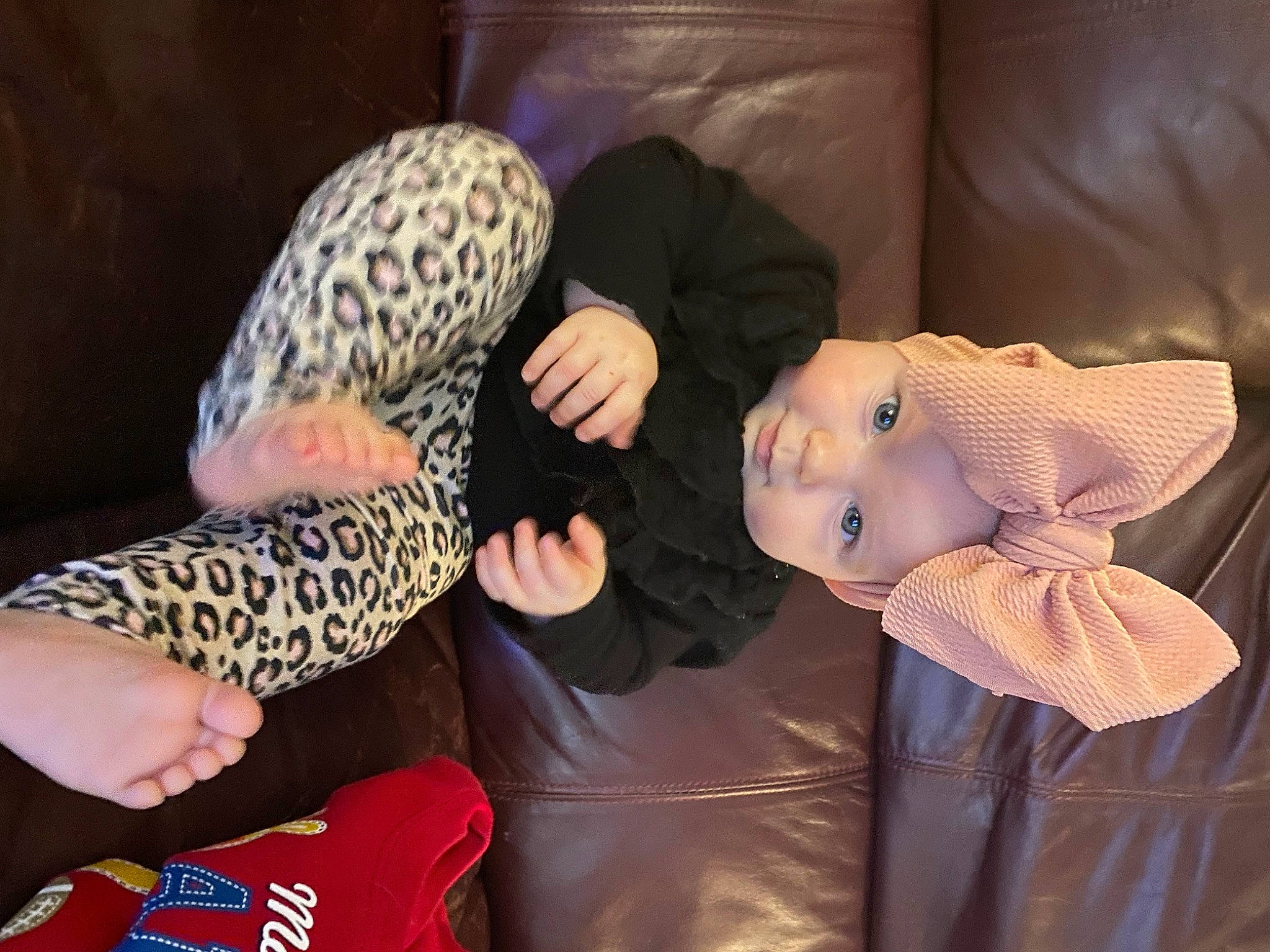 Maelynn is registered to the contest to win money with this photo: arm, child, comfort, event, finger, fun, hand, headgear, human_body, human_leg, lap, leg, mammal, nail, person, room, sitting, thigh, thumb, toy