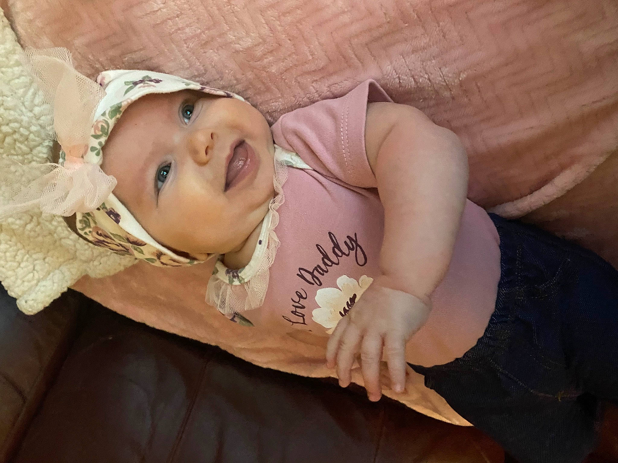 Maelynn is registered to the contest to win money with this photo: baby, baby_toddler_clothing, cheek, child, comfort, dress, eye, eyebrow, eyelash, finger, flash_photography, happy, hat, headwear, human_body, iris, lip, mouth, nose, person